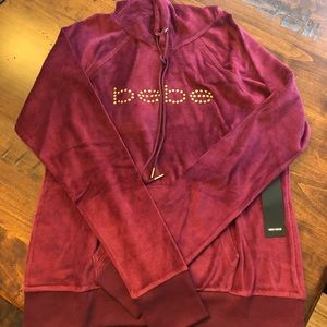 Bebe sport velour pullover with river stud logo
